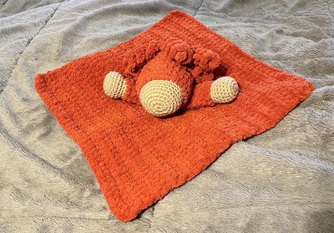 Crochet highland cow lovey